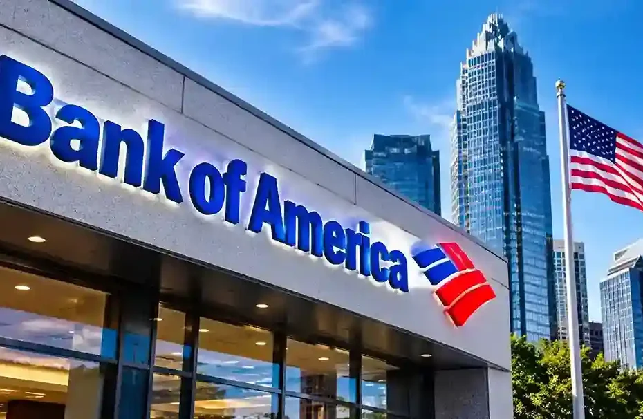 Bank of America building with its corporate logo, city skyscrapers, and American flag.